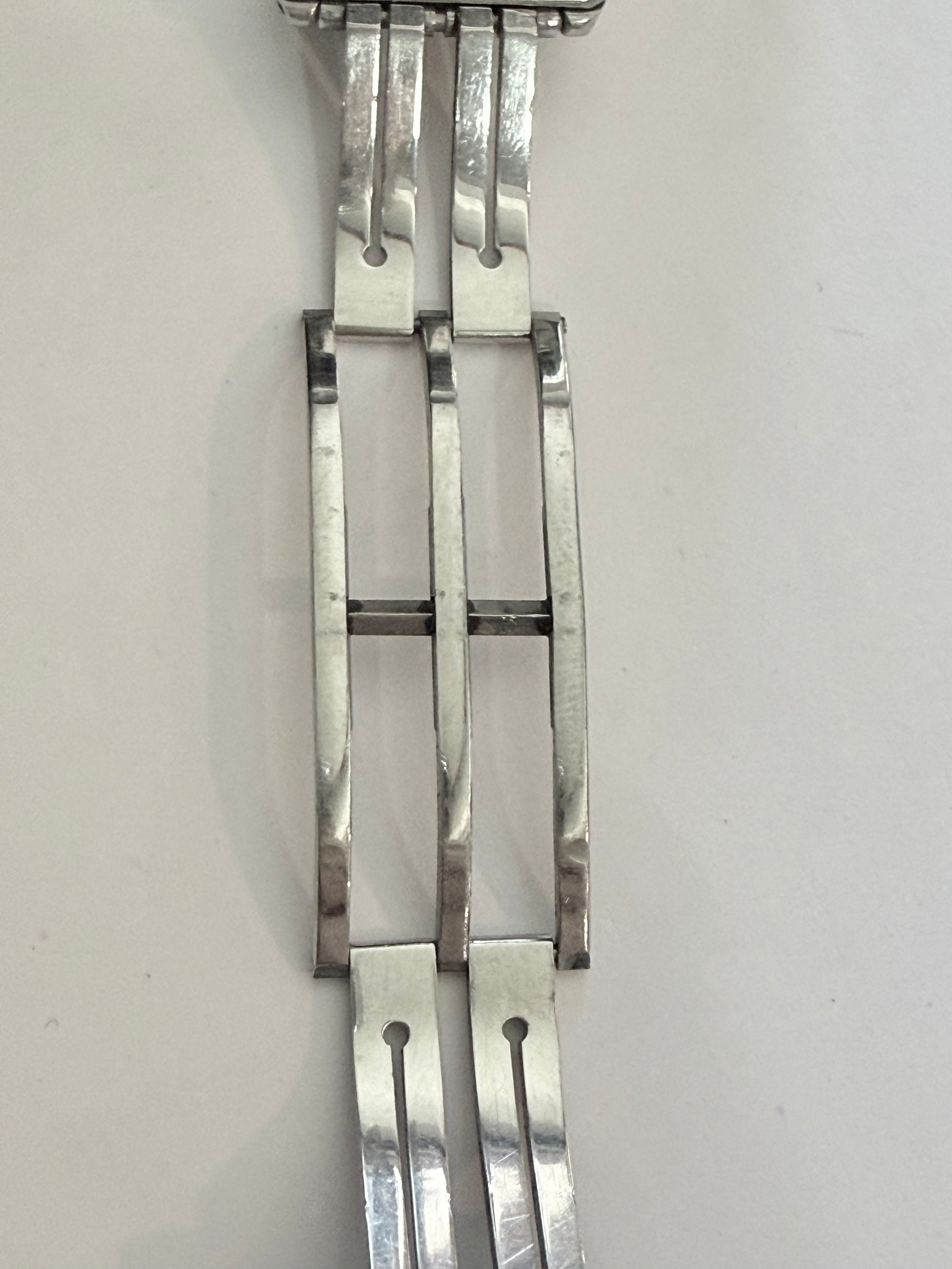 Breitling Rouleaux Bracelet 20mm Breitling Rouleaux (Bullet-Style) width, with authentic Breitling logo visible under magnification. Excellent condition and fully genuine.