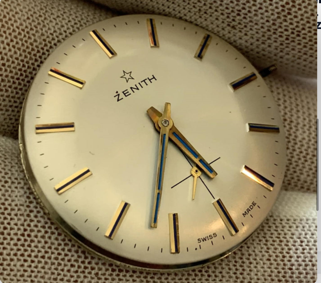 Brand: Zenith Caliber: 2541
Movement: Manual Wind
Jewels: 17 Jewels
Dial: Cream / beige dial with blue hour indicator ring Handes.