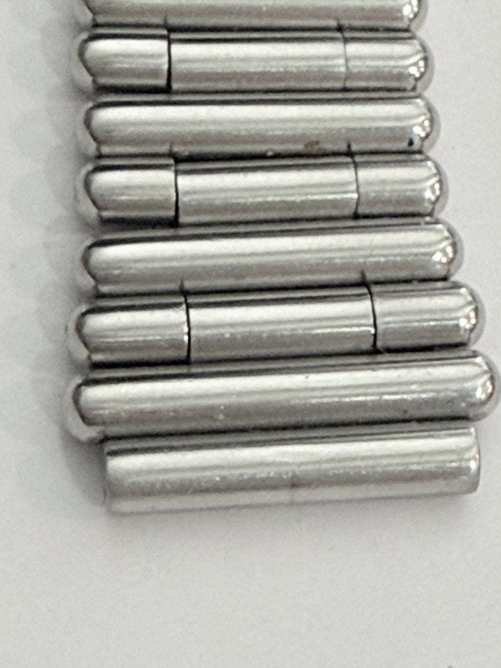 Breitling Rouleaux Bracelet 20mm Breitling Rouleaux (Bullet-Style) width, with authentic Breitling logo visible under magnification. Excellent condition and fully genuine.