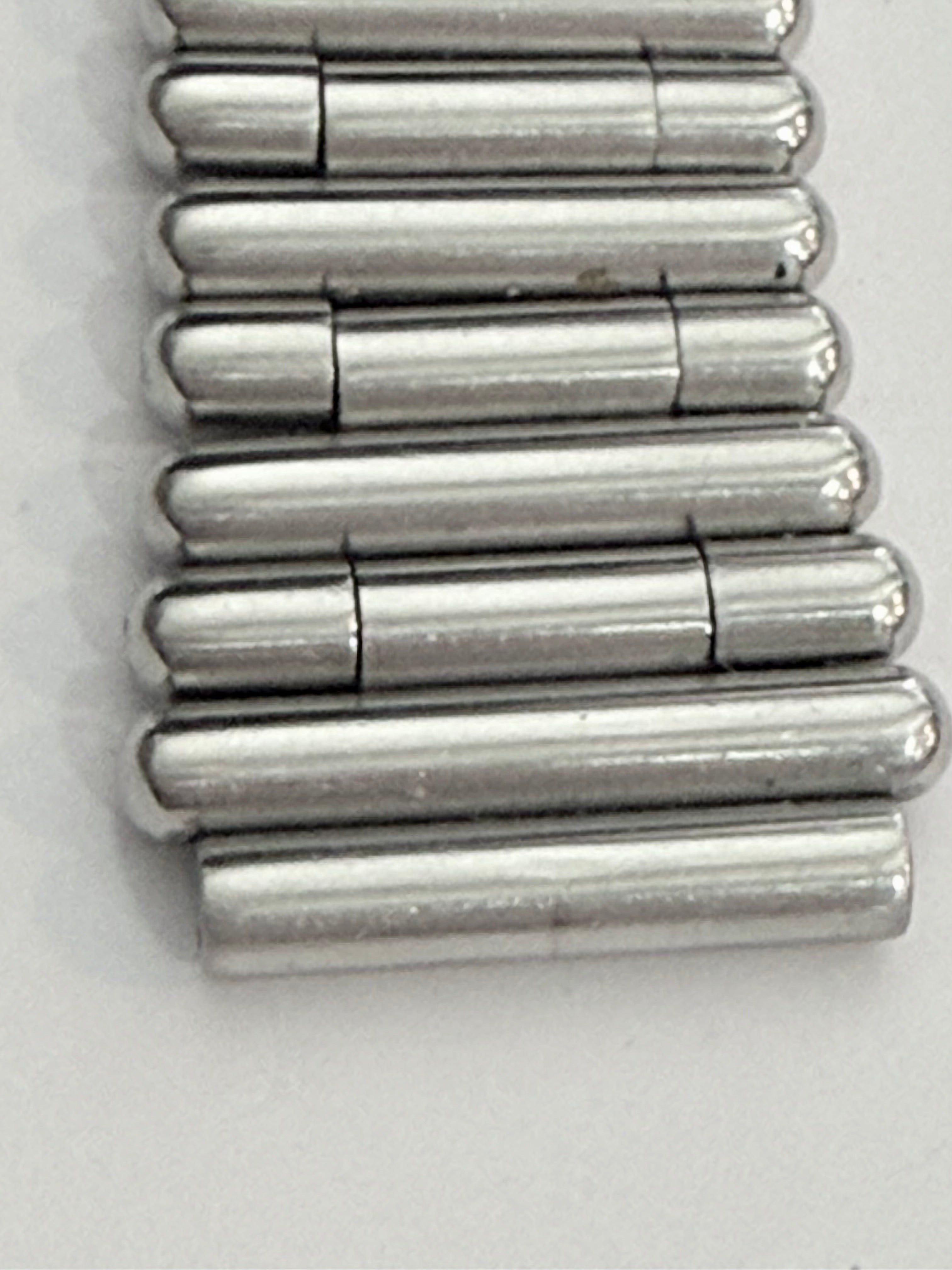 Breitling Rouleaux Bracelet 20mm Breitling Rouleaux (Bullet-Style) width, with authentic Breitling logo visible under magnification. Excellent condition and fully genuine.