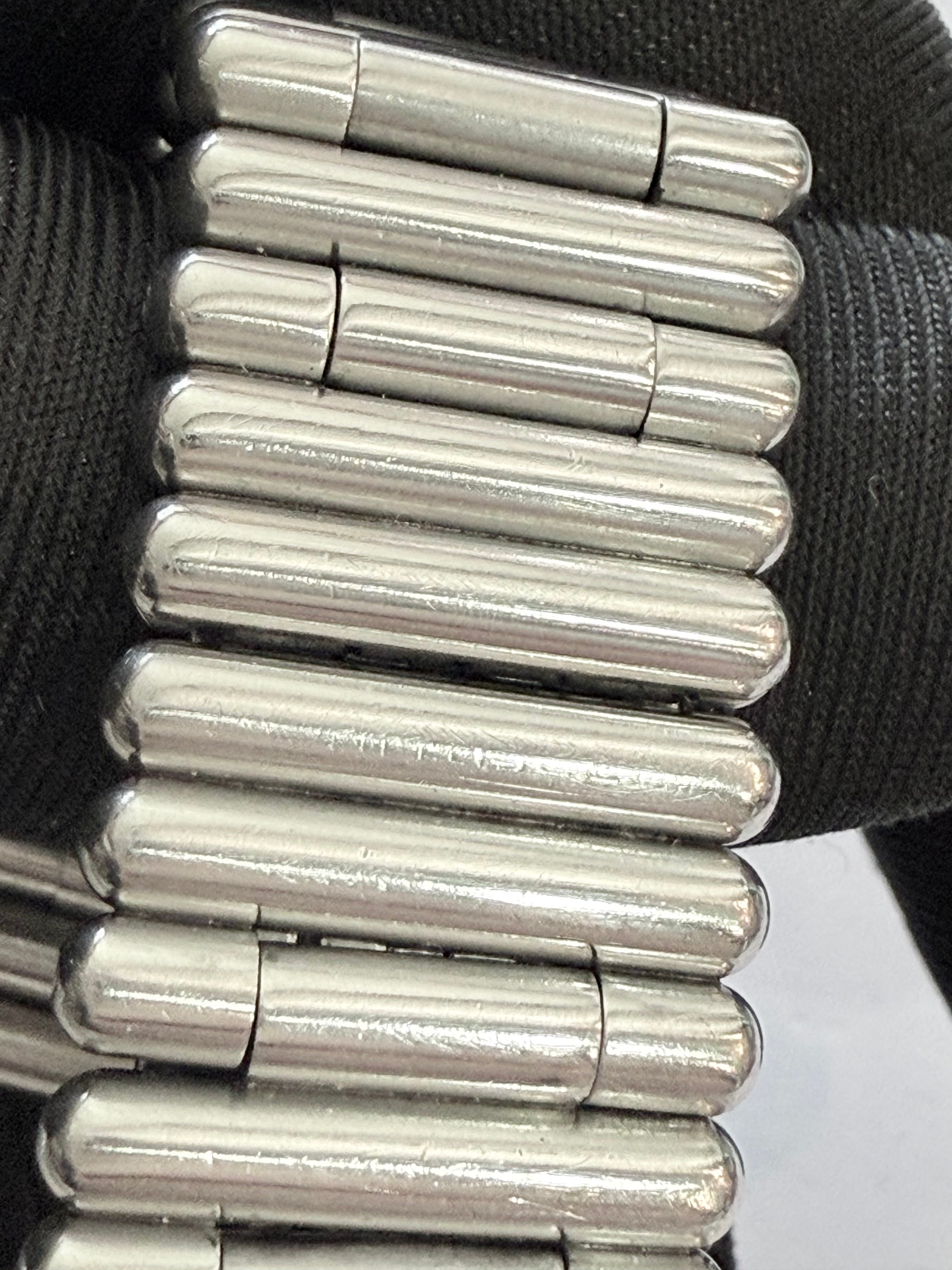 Breitling Rouleaux Bracelet 20mm Breitling Rouleaux (Bullet-Style) width, with authentic Breitling logo visible under magnification. Excellent condition and fully genuine.