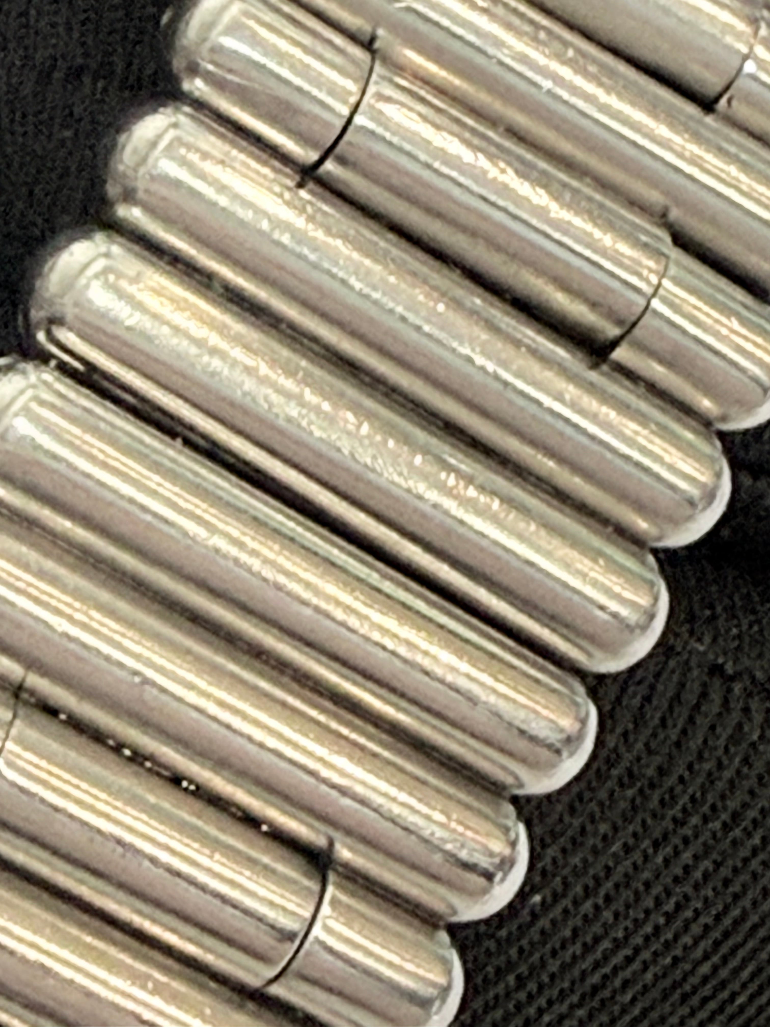 Breitling Rouleaux Bracelet 20mm Breitling Rouleaux (Bullet-Style) width, with authentic Breitling logo visible under magnification. Excellent condition and fully genuine.